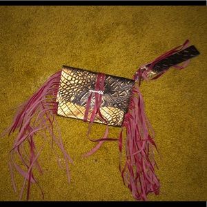 Bronze and red fringe clutch